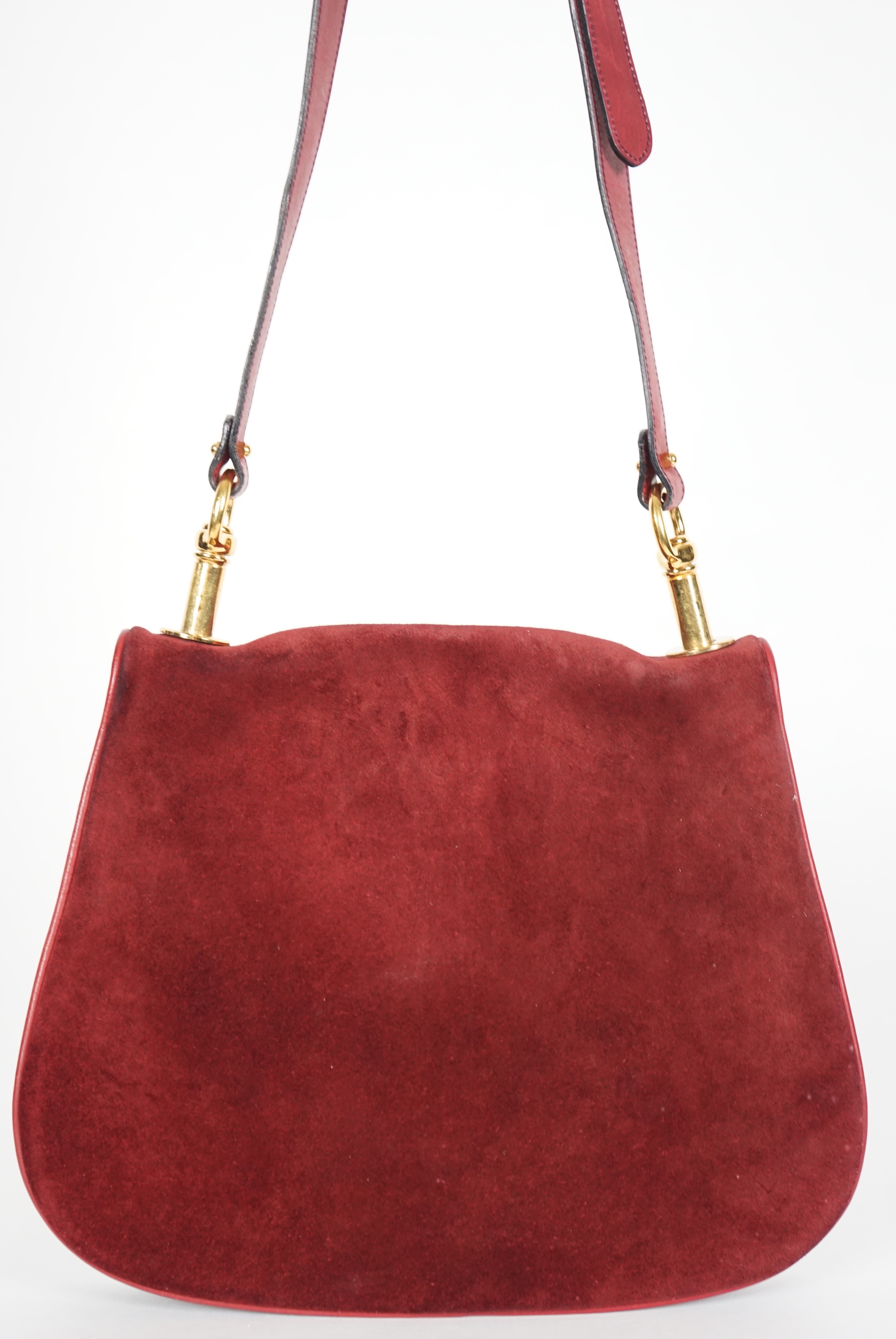 A vintage Gucci Blondie claret suede shoulder bag, width 29.5cm, max height 25cm, overall height 63cm to top buckle hole